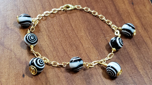 Black & White Swirl Czech Glass & Gold Tone Chain Bracelet. Adjustable to 7