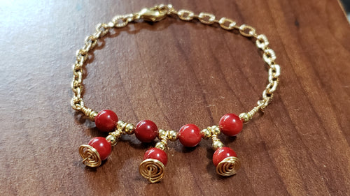 Red Coral Rounds with Gold Tone Chain & Wire Bracelet. Adjustable to 7