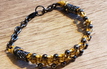 Load image into Gallery viewer, Metallic Gold Leather Bracelet with Black Czech Glass Beads &amp; Hemotite colored Stainless Steel Chain, Adjustable up to 7.5&quot; with Lobster Claw Clasp.
 