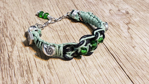 Black Leather & Natural Green Hemp Bracelet with Czech Glass and Silver Plated Shell Beads, Adjustable with Lobster Claw Clasp.
 