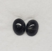 Load image into Gallery viewer, Black Star Oval (pair) 2.62 cts Loose A 8mm x 6mm Gemstone